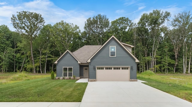 view of front facade with a garage and a front yard