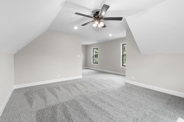 bonus room featuring carpet floors, ceiling fan, and vaulted ceiling