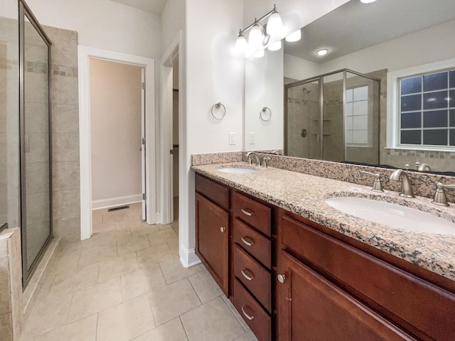 3047 Dogwood Trl, Spring Hill, TN 37174 - bathroom with a stall shower, tile patterned flooring, and double vanity