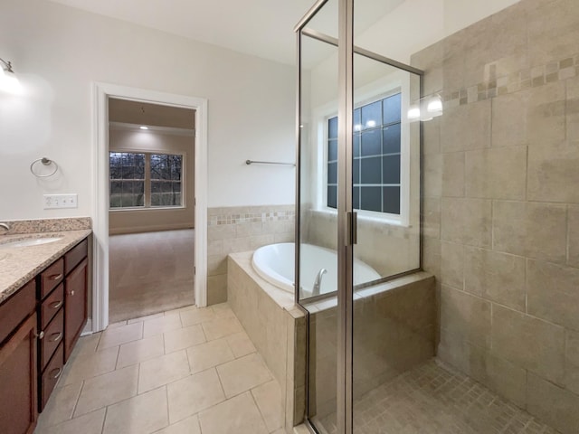 3047 Dogwood Trl, Spring Hill, TN 37174 - bathroom with tile patterned flooring, a stall shower, a garden tub, and vanity