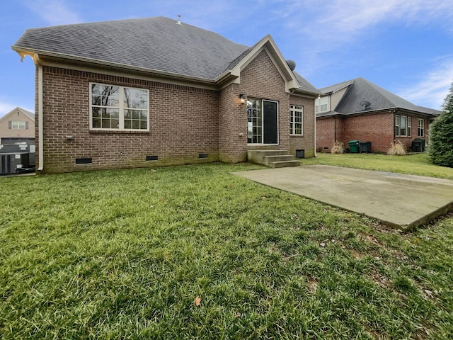 3047 Dogwood Trl, Spring Hill, TN 37174 - rear view of property featuring crawl space, brick siding, a patio, and a lawn
