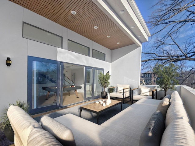 view of patio / terrace featuring a balcony and outdoor lounge area