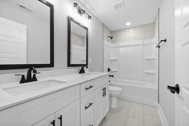 full bathroom with shower / tub combination, vanity, and toilet