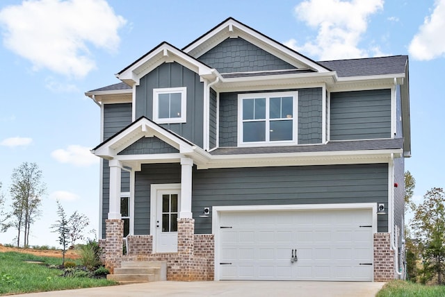 craftsman house with a garage