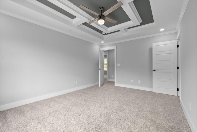 unfurnished bedroom with coffered ceiling, crown molding, and carpet flooring