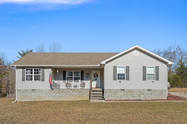 single story home featuring a porch and a front lawn