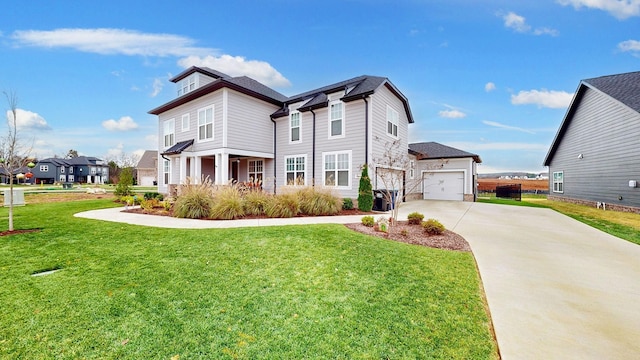 view of front of house featuring a garage and a front lawn