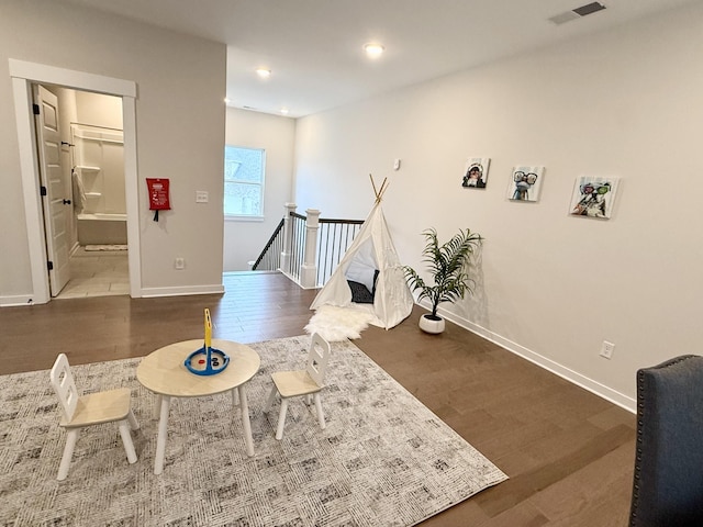 living area featuring dark hardwood / wood-style floors