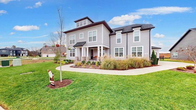 view of front facade featuring a front yard