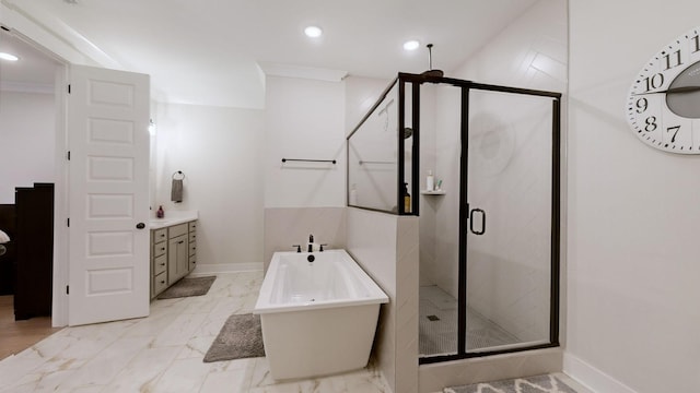 bathroom featuring independent shower and bath, vanity, and crown molding