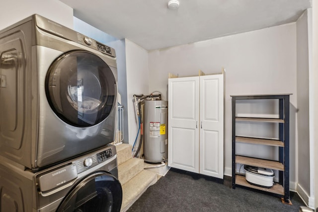 laundry area with cabinets, stacked washer and dryer, dark carpet, and electric water heater