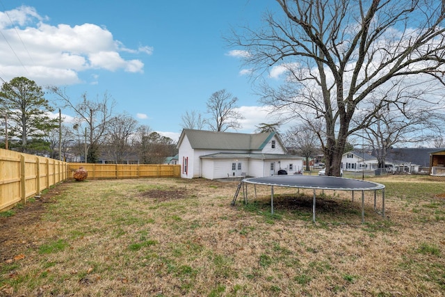 view of yard featuring a trampoline