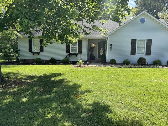 ranch-style house with a front yard