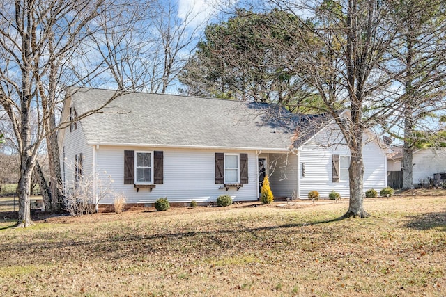 view of front of property with a front lawn