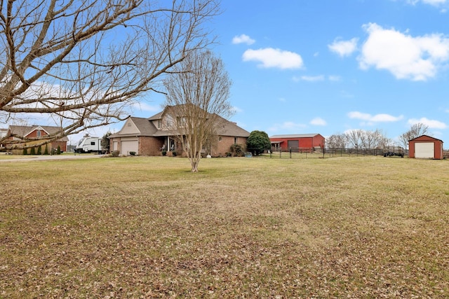 view of yard with a garage