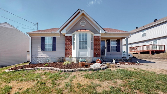 view of front of property featuring brick siding