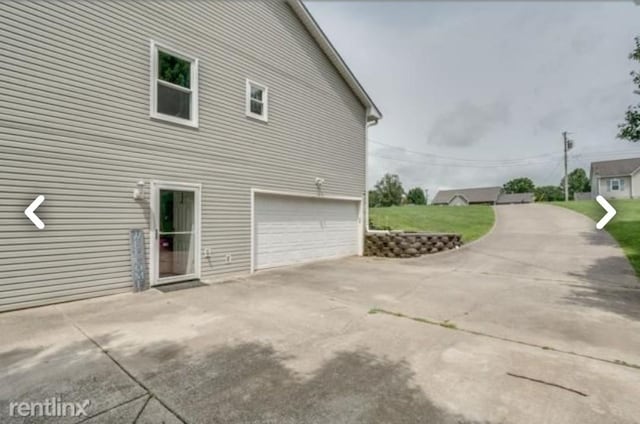 view of home's exterior with a garage