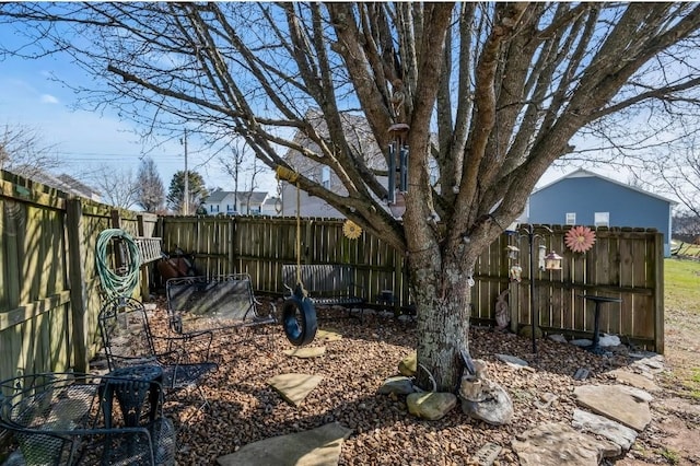 view of yard featuring a fenced backyard