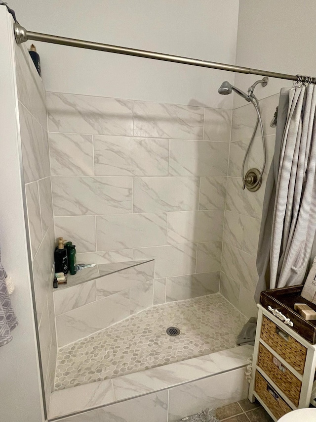 full bath featuring a stall shower