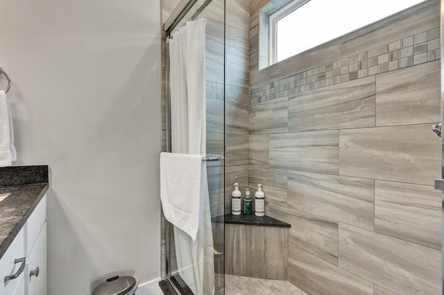 bathroom featuring vanity and a shower with shower curtain