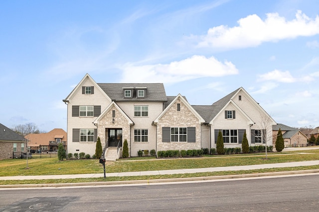 view of front of house featuring a front lawn