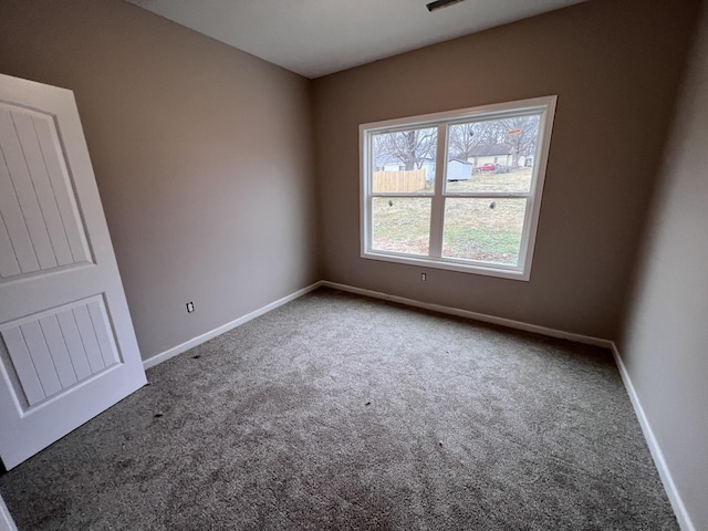 view of carpeted spare room