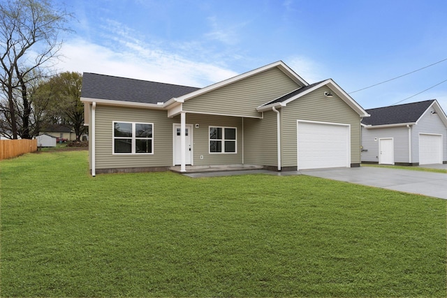ranch-style home with a front yard, concrete driveway, fence, an attached garage, and a shingled roof