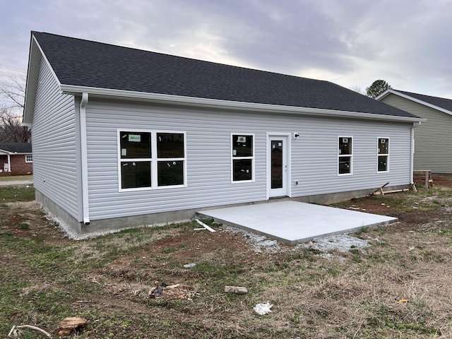 back of house with a patio area