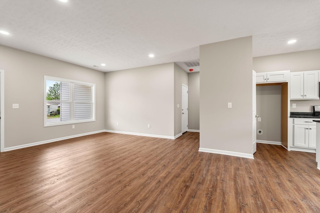 805 Shepard St S, Winchester, TN 37398 - unfurnished living room with baseboards, visible vents, recessed lighting, and dark wood finished floors