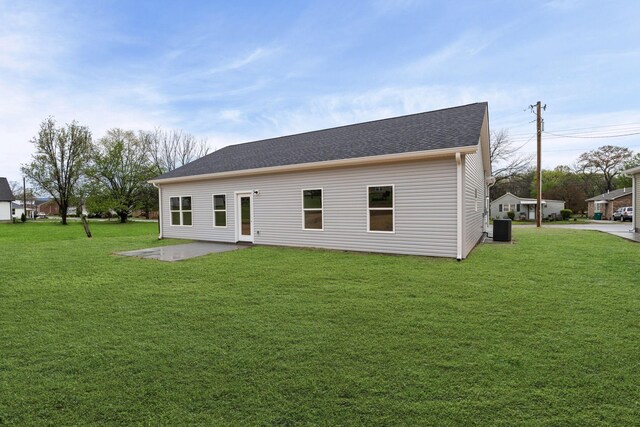 805 Shepard St S, Winchester, TN 37398 - rear view of property featuring a lawn, central AC unit, a patio, and roof with shingles