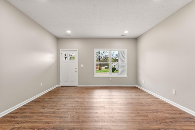 805 Shepard St S, Winchester, TN 37398 - foyer entrance with baseboards, wood finished floors, recessed lighting, and a textured ceiling