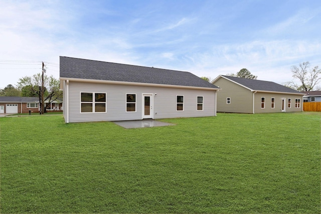 805 Shepard St S, Winchester, TN 37398 - back of house with a lawn, a patio, and roof with shingles