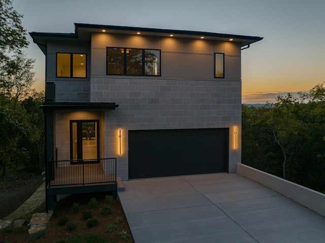 modern home featuring a garage