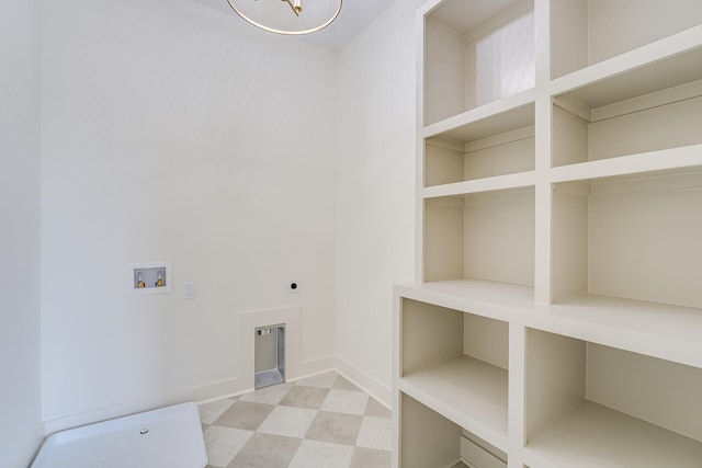 laundry area featuring hookup for an electric dryer and hookup for a washing machine