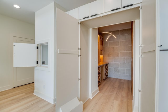 hallway featuring light hardwood / wood-style floors