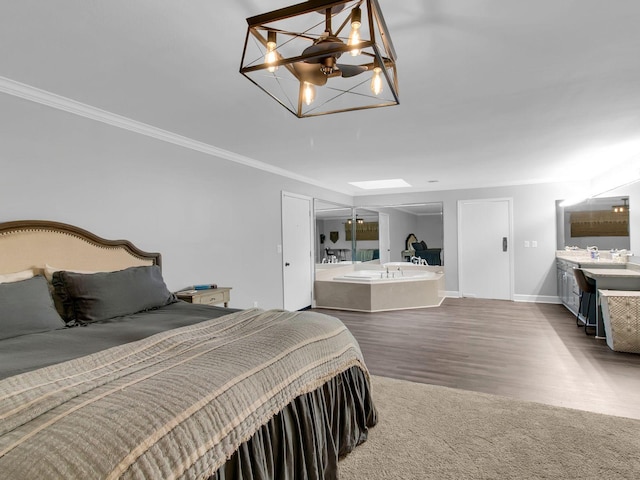 bedroom featuring dark wood-type flooring, crown molding, and a chandelier