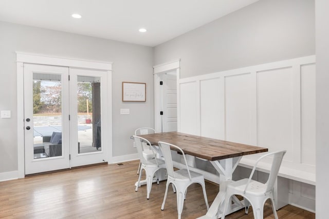 dining room featuring light hardwood / wood-style flooring