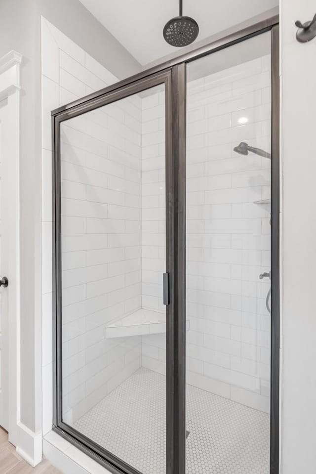 bathroom featuring an enclosed shower