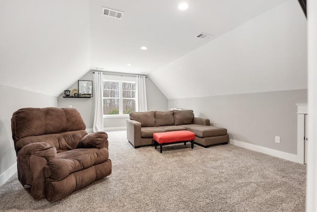 living room with lofted ceiling and carpet