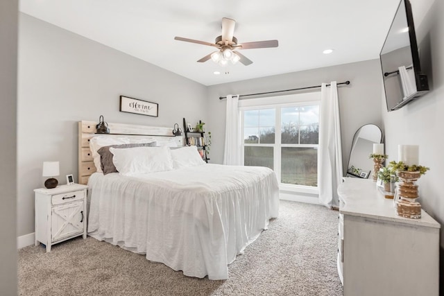 carpeted bedroom featuring ceiling fan