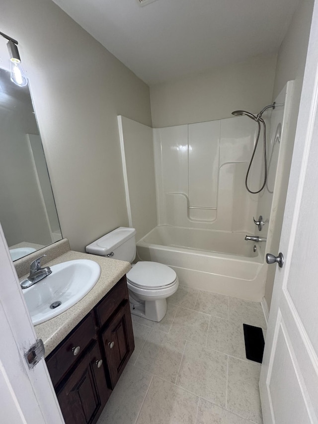 full bathroom featuring vanity, tub / shower combination, and toilet