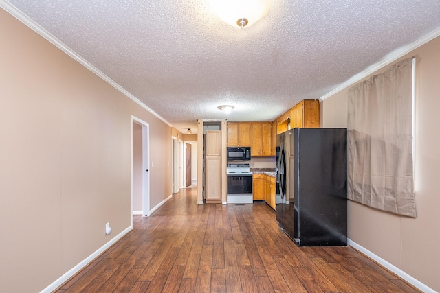 kitchen with crown molding, dark wood-type flooring, black appliances, and a textured ceiling