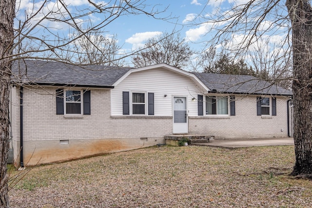 single story home featuring a patio and a front lawn