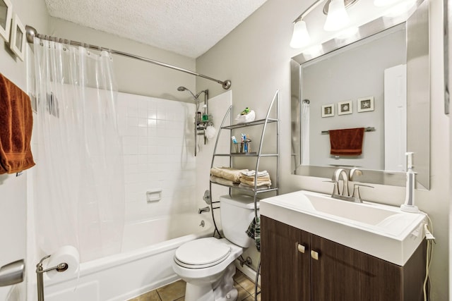 full bathroom featuring tile patterned flooring, vanity, a textured ceiling, toilet, and shower / bath combo with shower curtain