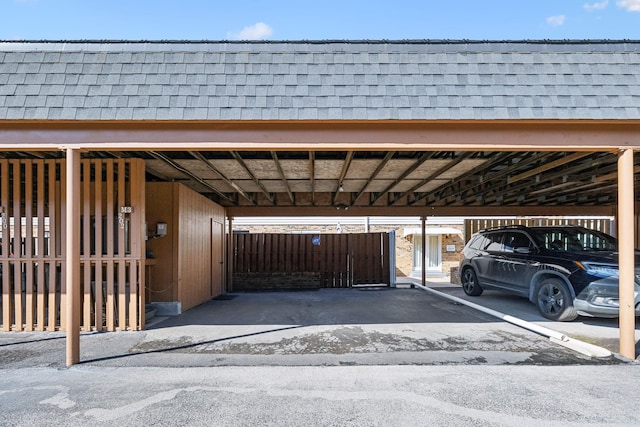 view of car parking featuring a carport