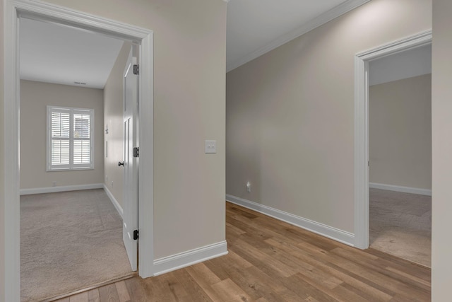 hall with light wood-type flooring