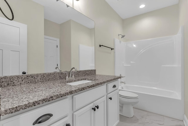 full bathroom featuring shower / bathtub combination, vanity, and toilet