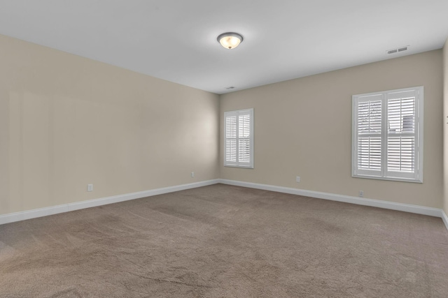 view of carpeted spare room