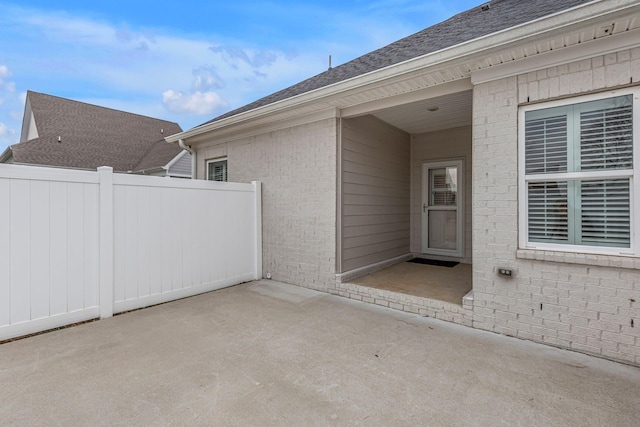 doorway to property featuring a patio area