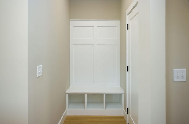 mudroom with light wood-style floors